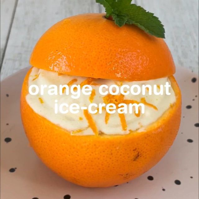 This orange coconut ice cream is not only healthy, but once you’ve had one, we promise you’ll keep coming back for more.Serves: 6Prep: 15 minutesFreeze: 3 hoursIngredients:1 can full-fat coconut milk, chilled overnight1/2 cup Nudie pulp free orange juice1 packed tbsp orange zest1/2 cup sugar-free granulated sugar of choice
1 tsp vanilla extractPinch of salt1 fresh orangeOptional: 1-2 tbsp lemon juice for tartnessMethodAdd all the ingredients into a blender and blend until smooth.Pour into a loaf pan or a container of your choice, cover and freeze for a minimum of 3 hours (within the first hour give it a stir 1-2 times then let set completely).Allow to thaw at room temperature slightly to soften. In the meantime, cut about 1/3 of the top of an orange and set aside. With the remaining 2/3, use a small paring knife and a spoon to carve out the flesh. You can also slice a thin piece off the bottom so it stands upright and doesn’t roll around. Use this as your orange bowl/cup to serve your ice-cream in!Notes:* Another option is to pour the coconut mixture into silicone ice cube trays, freeze then blend with a splash of liquid until smooth.